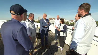 Bayerns Sportminister Herrmann sondiert Olympia-Segeln in Warnemünde